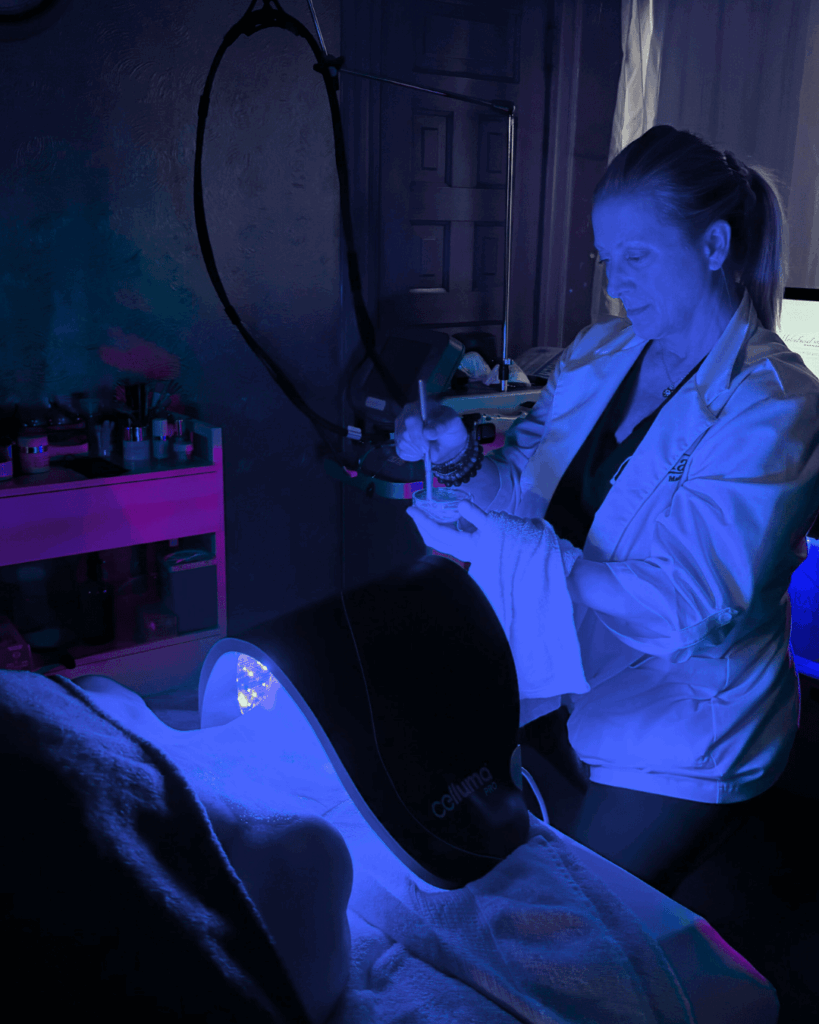 Client receiving blue LED light therapy with Celluma Pro at Catara Med Spa in Algonquin, IL. Acne treatment and calming facial session.