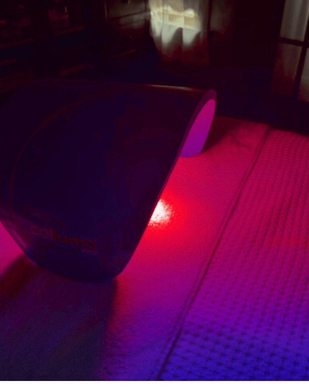 LED red light therapy session using Celluma Pro device at Catara Med Spa in Algonquin, IL. Skin rejuvenation and collagen stimulation in spa setting.