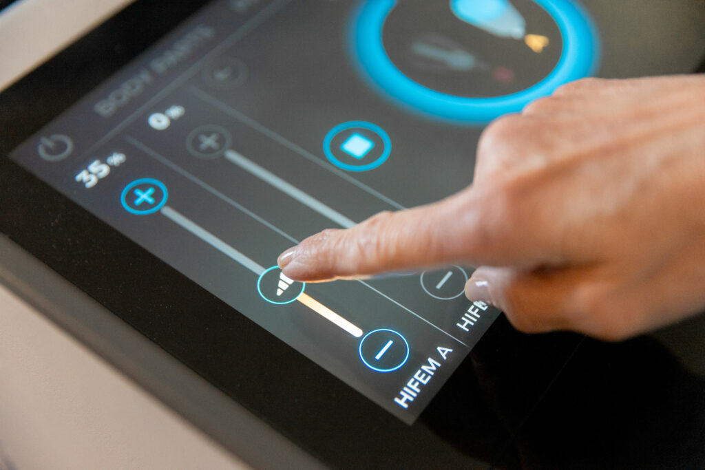 Close-up of touchscreen settings on a body contouring device at Catara Med Spa in Algonquin, IL.