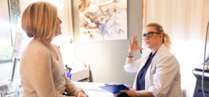 Client and provider in a consultation session at Catara Med Spa in Algonquin, IL, discussing treatment options in a calm setting.