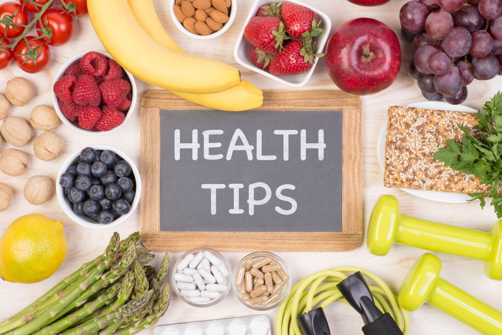 health tips image with fruits veggies vitamins and workout gear used by catara med spa algonquin il for wellness and nutrition coaching