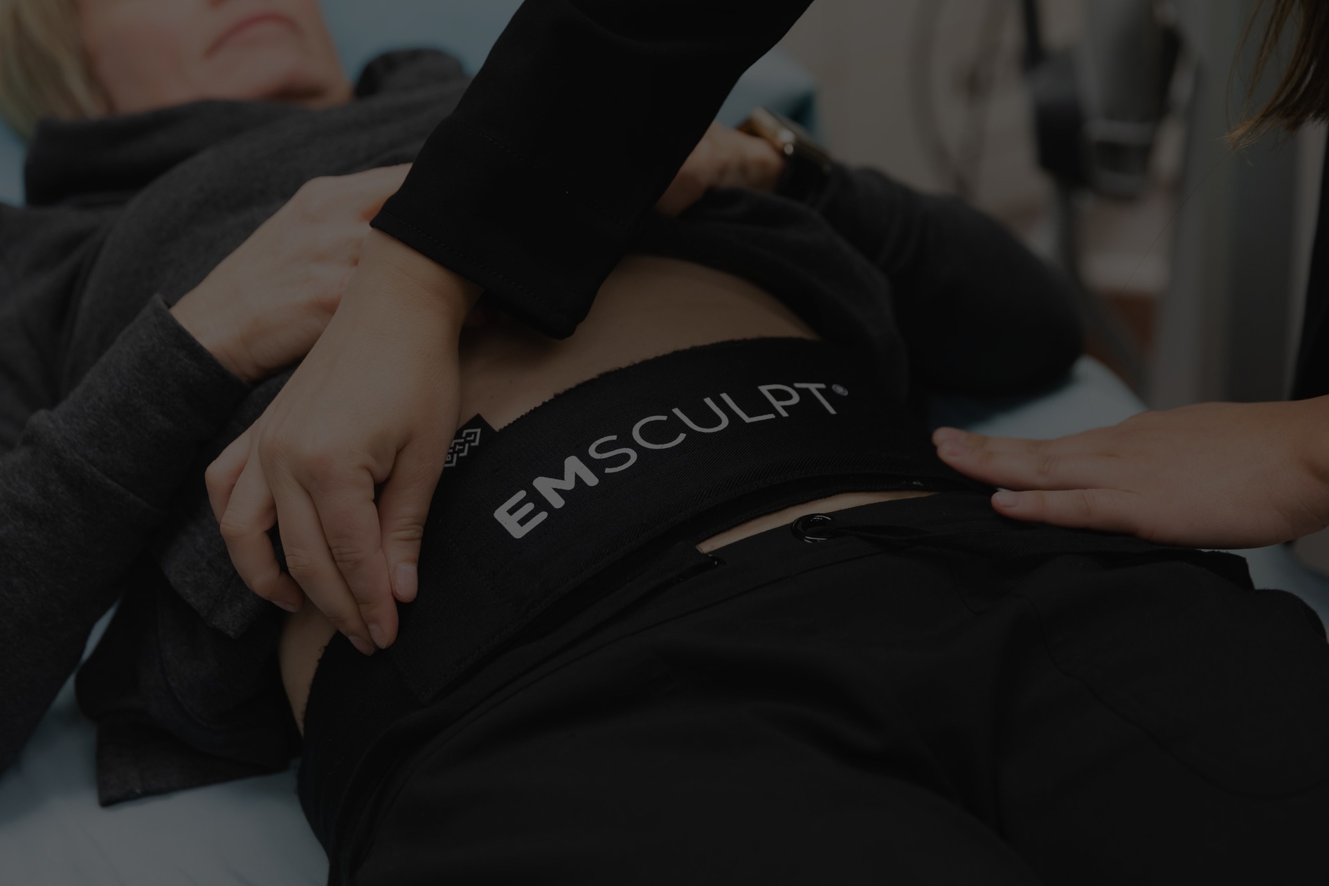 Emsculpt Neo device in use for non-invasive body sculpting, fat reduction, and muscle toning treatment.