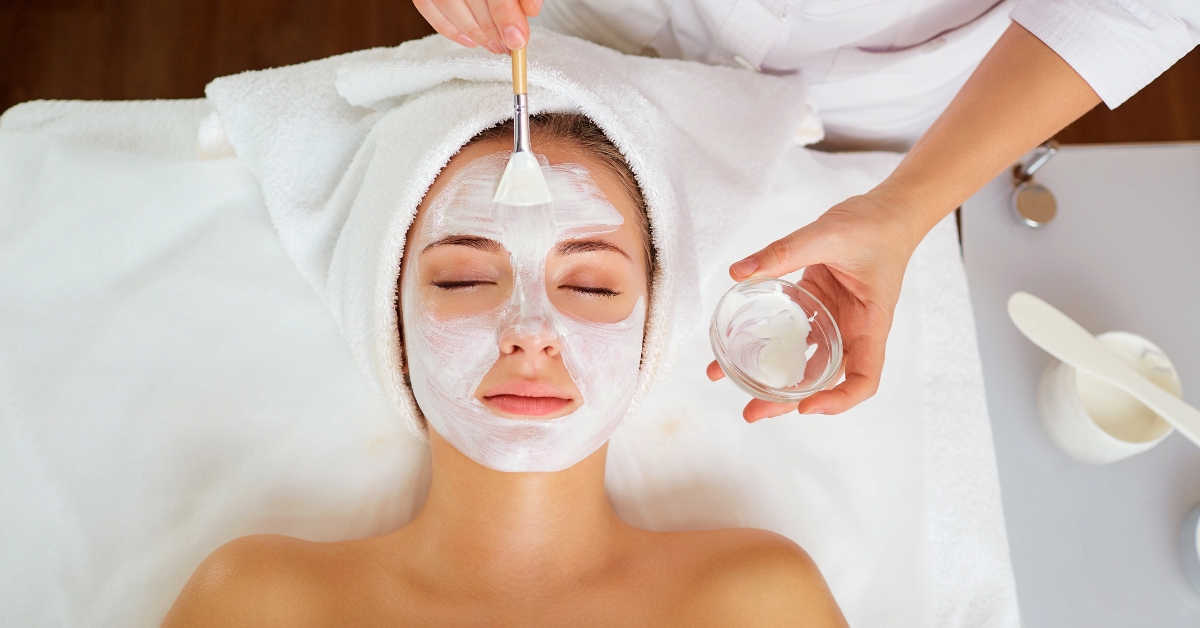 Client receiving a gentle facial mask, showcasing a pregnancy-safe skincare treatment at Catara Med Spa.